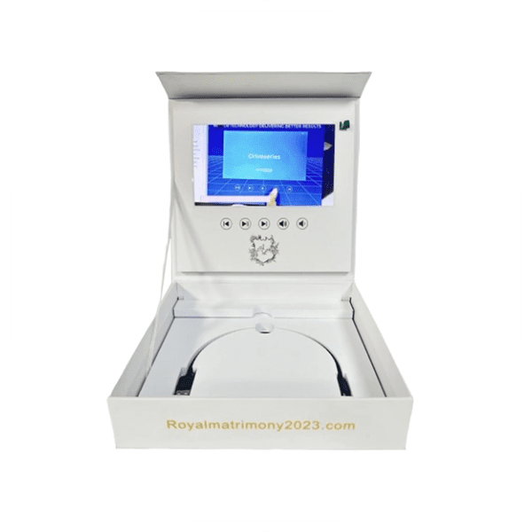 A white box with a tablet and headphones inside of it