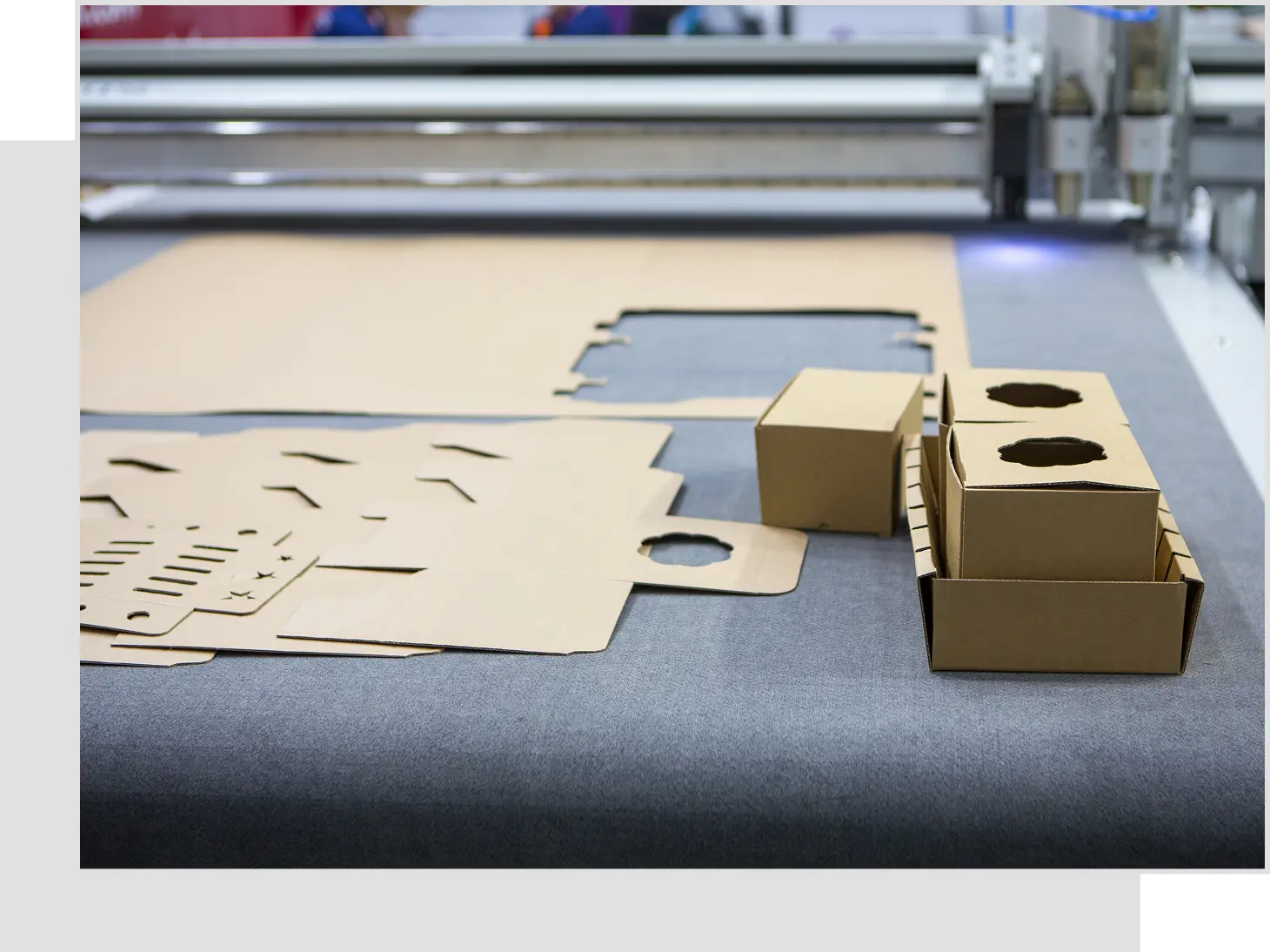 A table with cardboard boxes on it